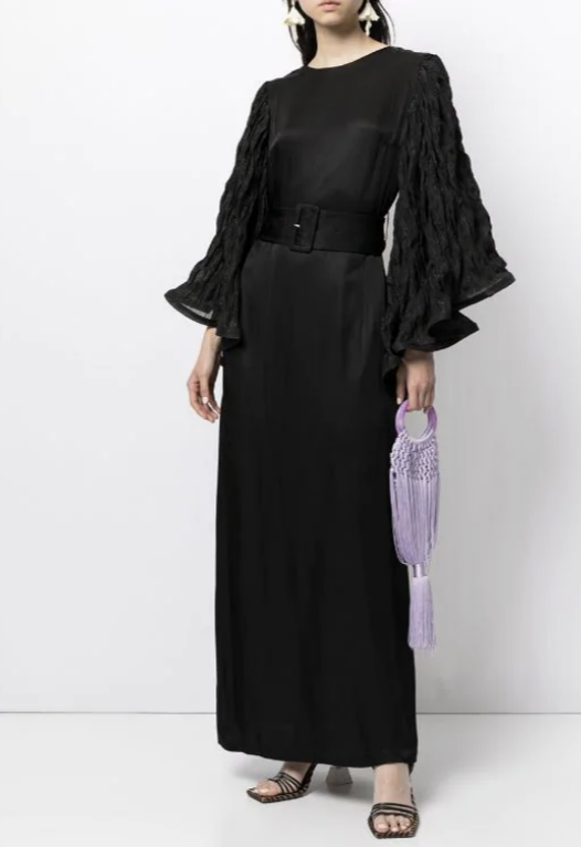 Long dress with dramatic sleeves.